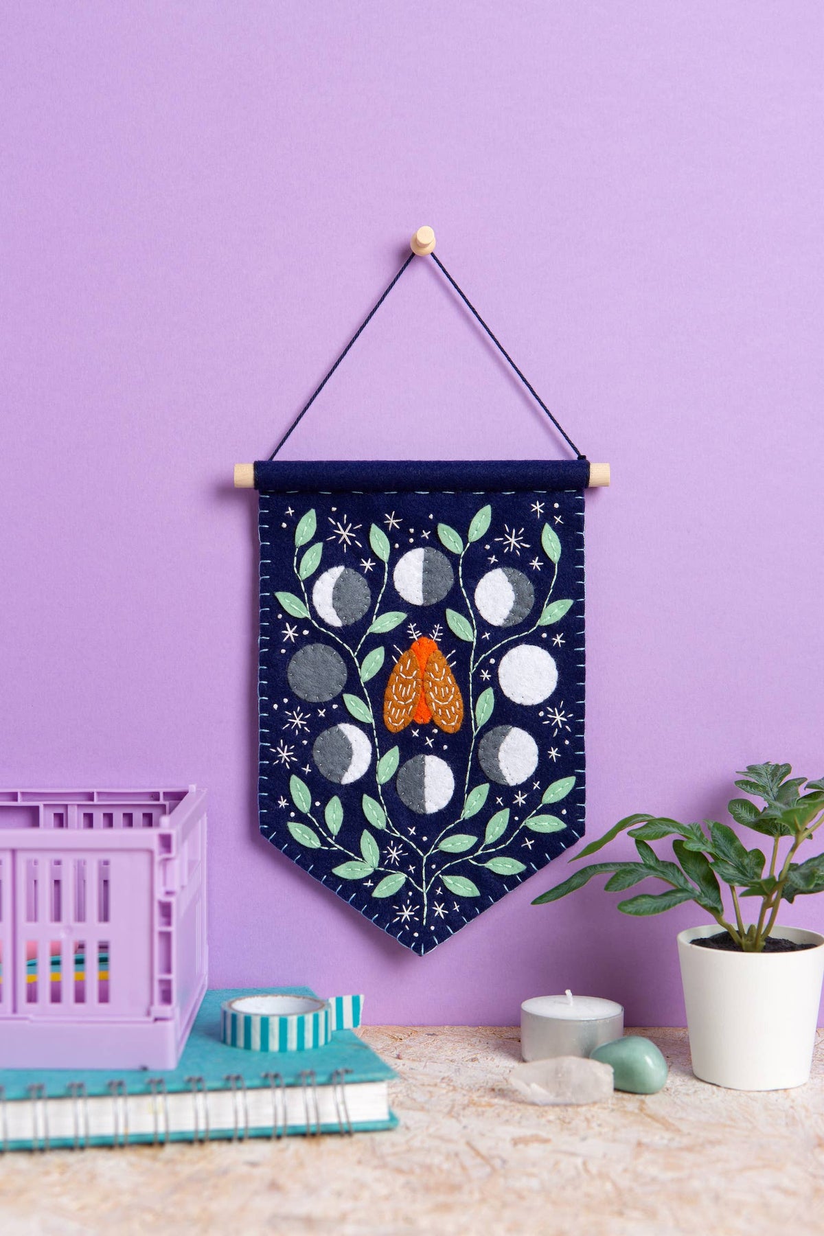Celestial moth and moon phases felt pennant stitched from wool and viscose felt