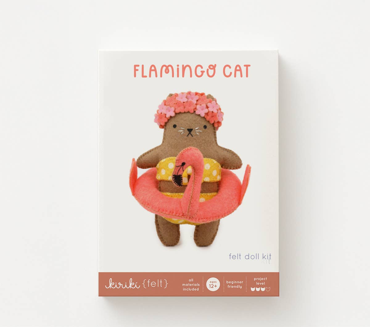 Flamingo Cat felt doll kit in its screen printed Kiriki Press packaging