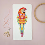 Mandala Parrot cross stitch chart by Meloca Designs in bright tropical colors