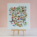 North American Adventure map cross stitch design on pale blue 14 count aida, stitched in 14 DMC shades