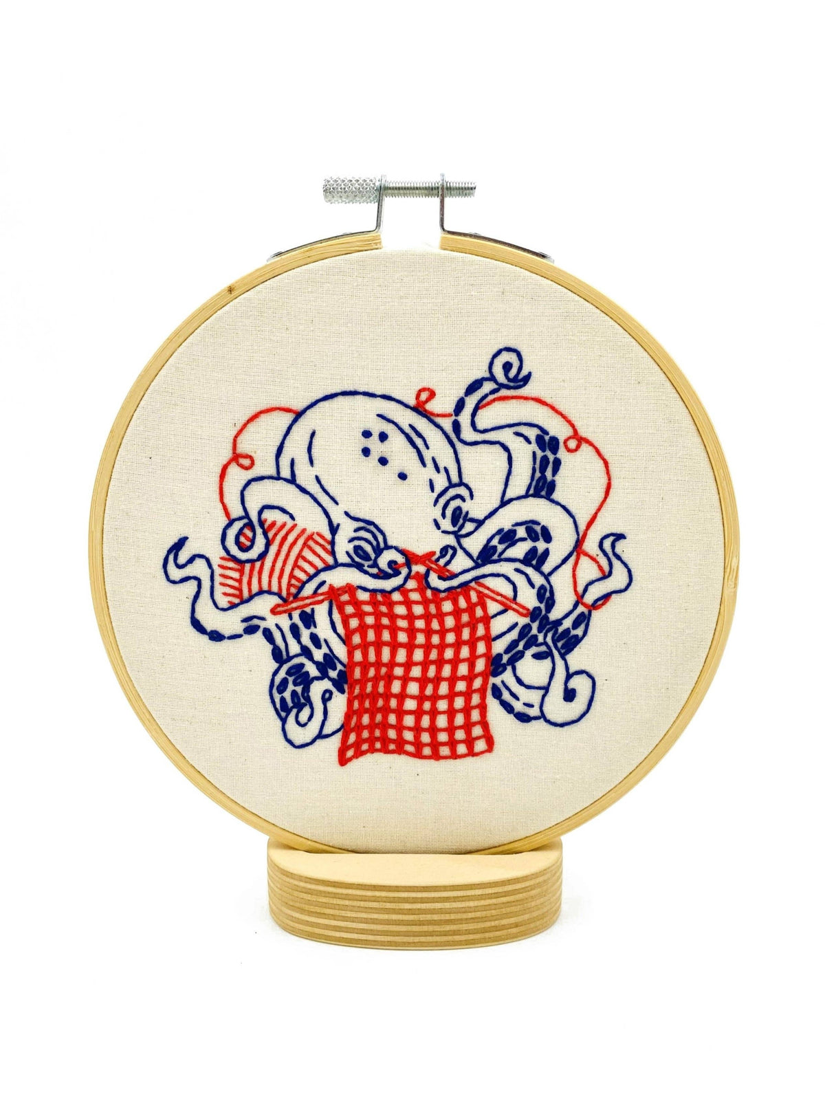 Knitting Octopus embroidery kit contents including hoop, floss and needle
