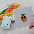 Kawaii pineapple cross stitch design on 14 count Aida