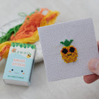 Kawaii pineapple cross stitch design on 14 count Aida