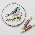 Long-tailed Tit counted cross stitch kit by Stitchkits Crafts, finished in a Liberty wrapped 6 inch hoop