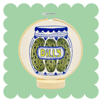 Pickles embroidery design on unbleached cotton in a hoop