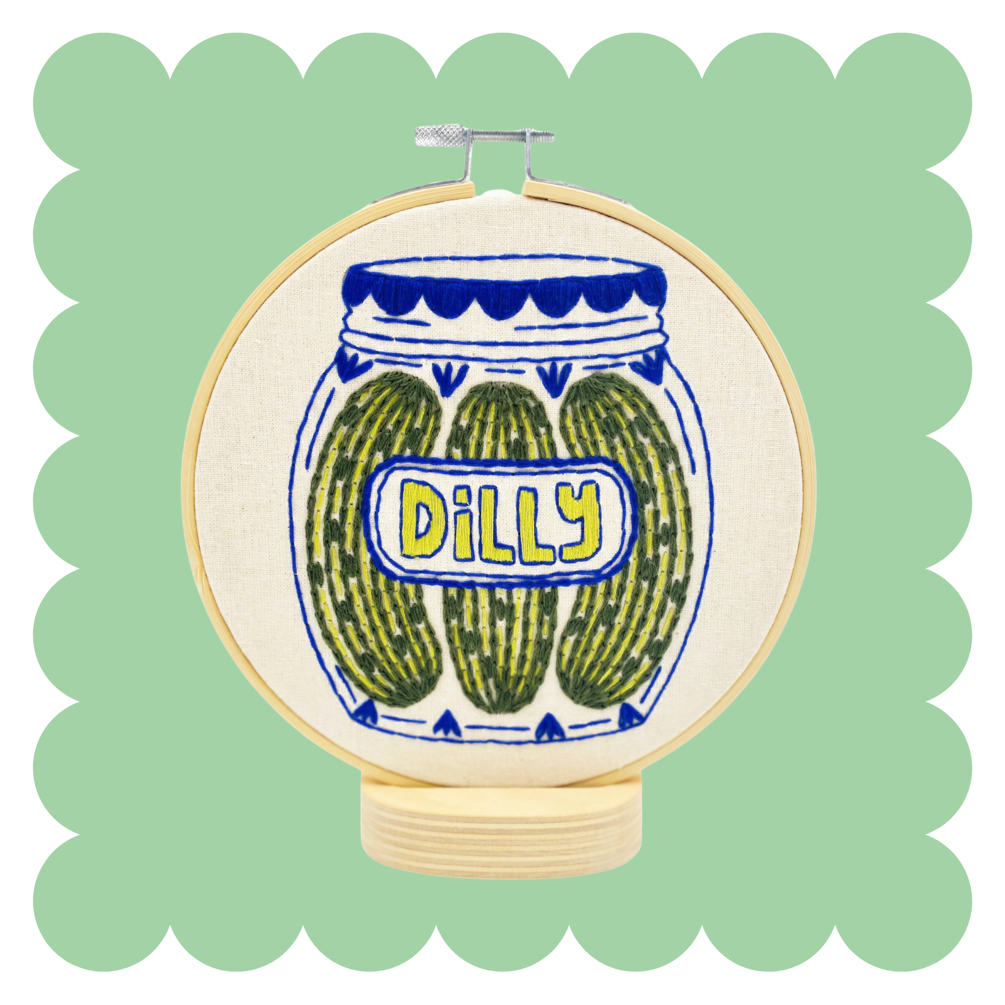Pickles embroidery design on unbleached cotton in a hoop