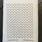 Stick the transfer over the hole, stitch the pattern, rinse the paper away
