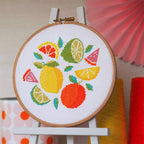 All the Zest citrus cross stitch design with lemon, lime, orange, grapefruit  on white aida