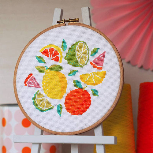 All the Zest citrus cross stitch design with lemon, lime, orange, grapefruit  on white aida