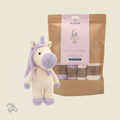 Finished Dolly unicorn amigurumi in white and lilac marbled yarn, 20 cm tall
