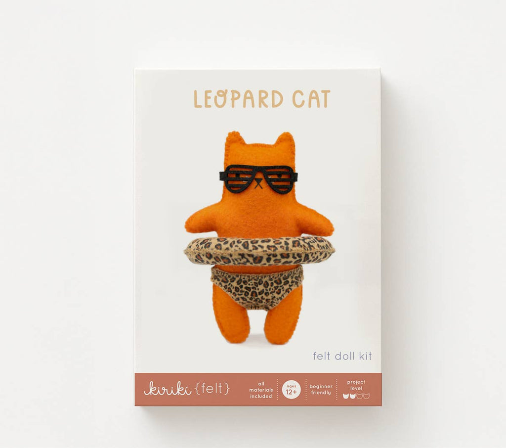 Leopard Cat felt doll kit in its screen printed Kiriki Press packaging