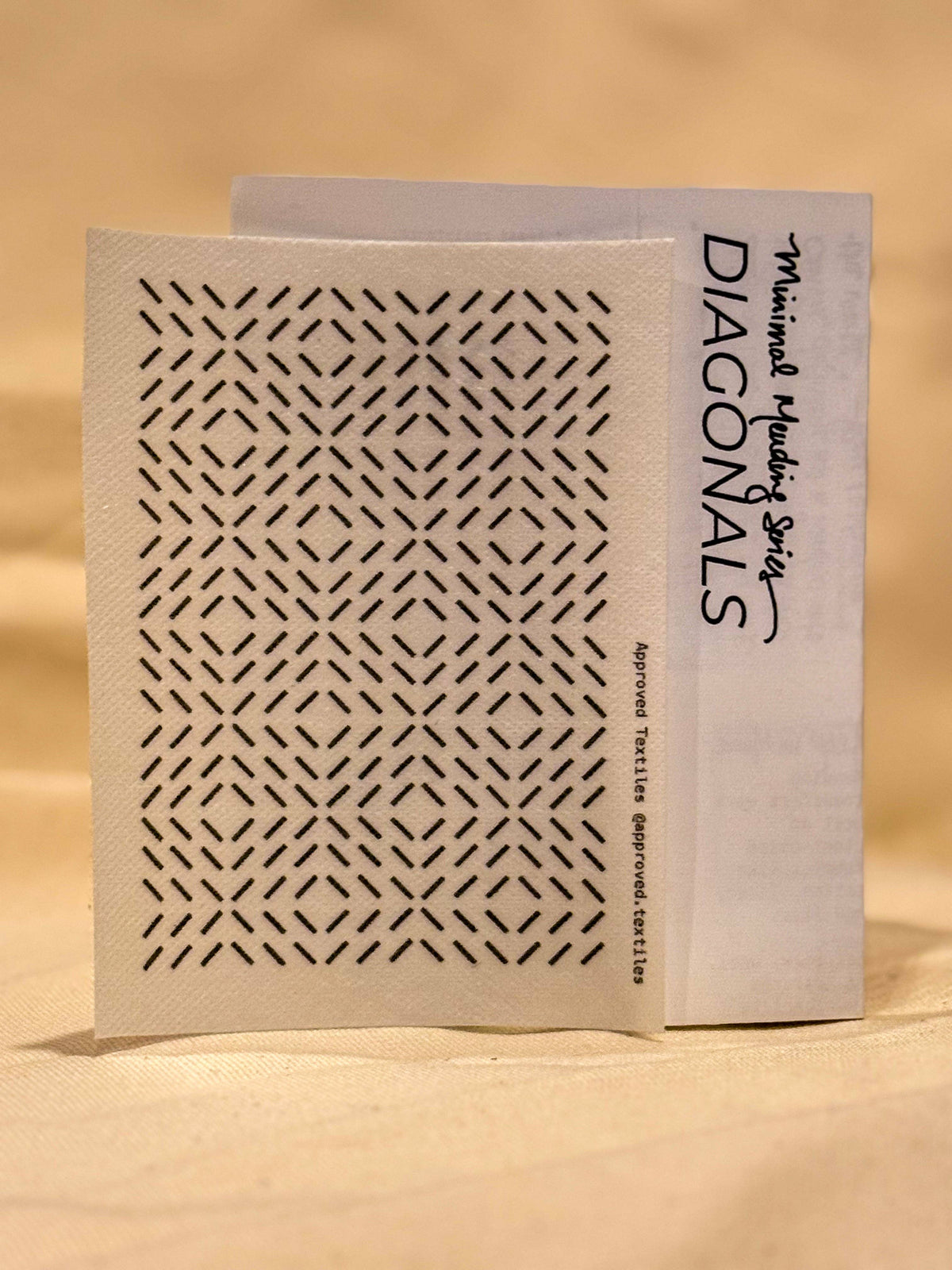 Diagonals sashiko style line transfers for hand stitched textile repair by Approved Textiles