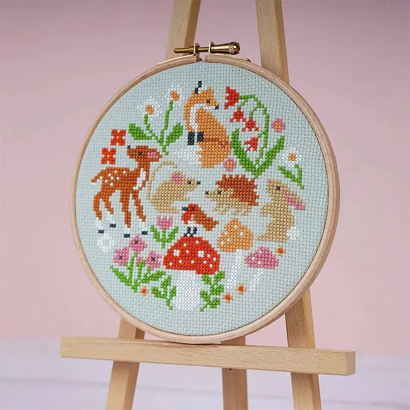 Woodland Whimsies cross stitch kit by Caterpillar Cross Stitch, stitched in 8 DMC shades on sage aida