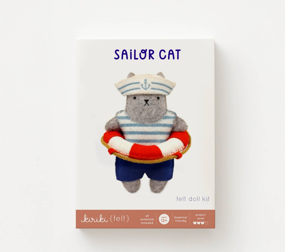 Sailor Cat felt doll kit in its screen printed Kiriki Press packaging