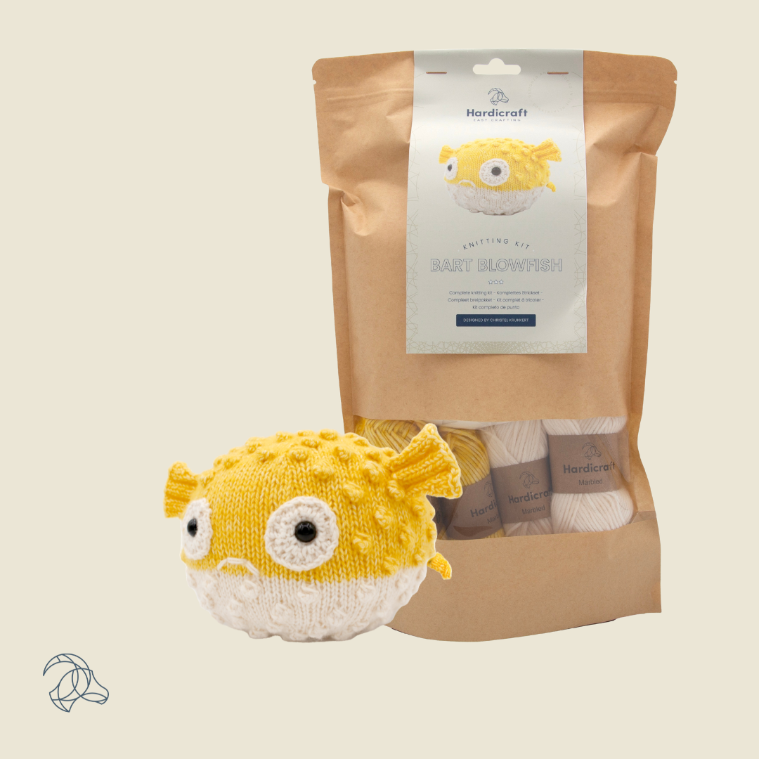 Knitted Bart Blowfish amigurumi in white and yellow marbled yarn