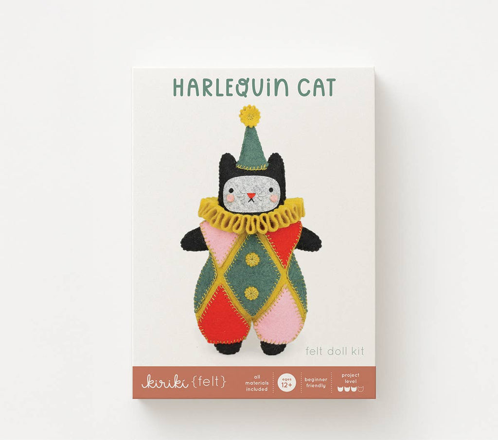 Harlequin Cat felt doll kit in its screen printed Kiriki Press packaging