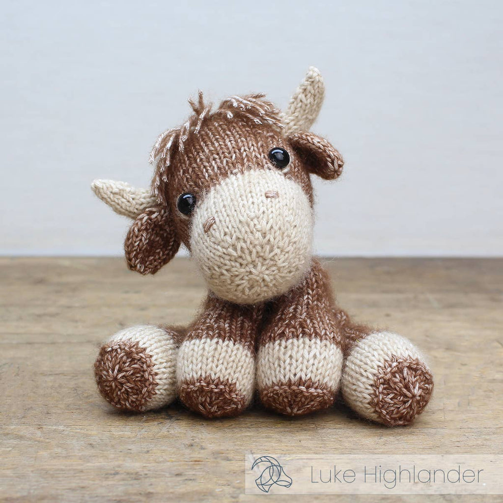 Finished Luke knitted Highland cow, about 20 cm tall