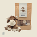 Knitted Luke Highland Cow amigurumi in beige and brown marbled yarn