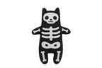 Skeleton Cat felt doll kit by Kiriki Press, white bones stitched on black felt