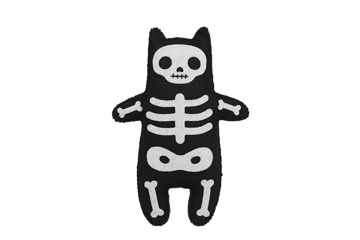 Skeleton Cat felt doll kit by Kiriki Press, white bones stitched on black felt
