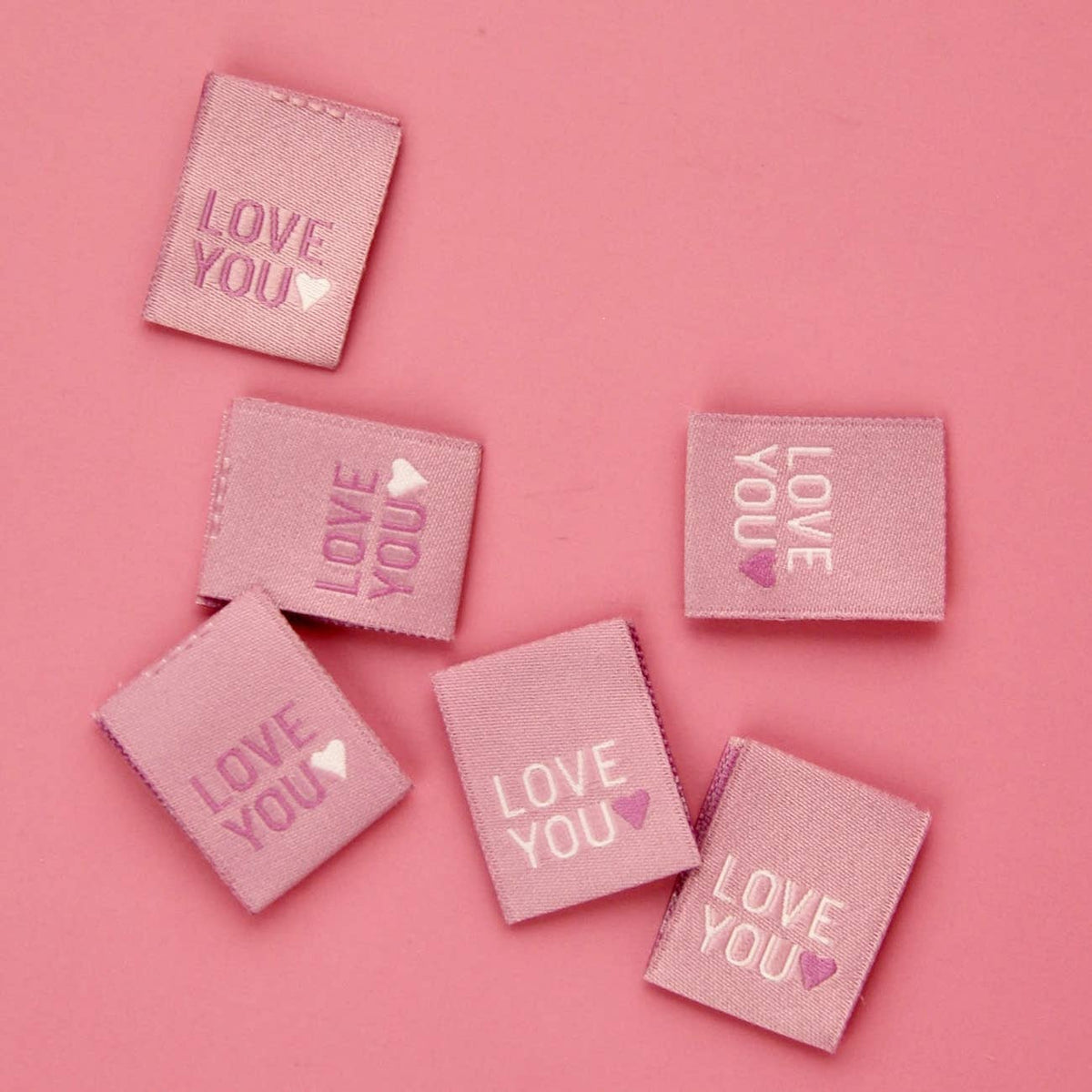 Love You woven sew-in label, reversible in white and pink