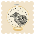 Raven Nevermore embroidery design on unbleached cotton in a hoop