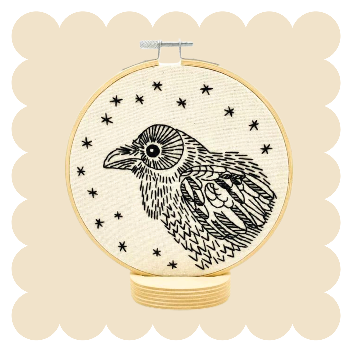 Raven Nevermore embroidery design on unbleached cotton in a hoop