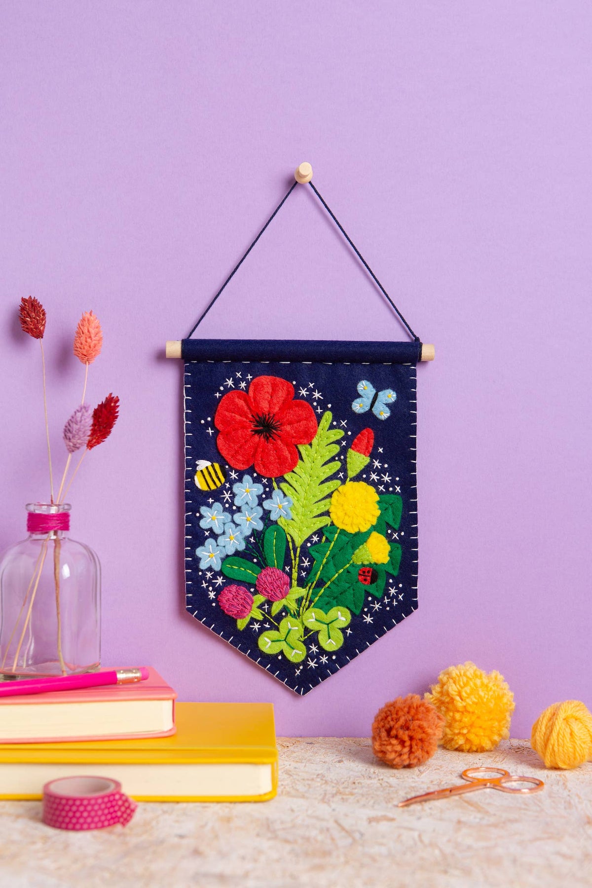 Wildflower felt pennant wall hanging stitched from wool and viscose felt