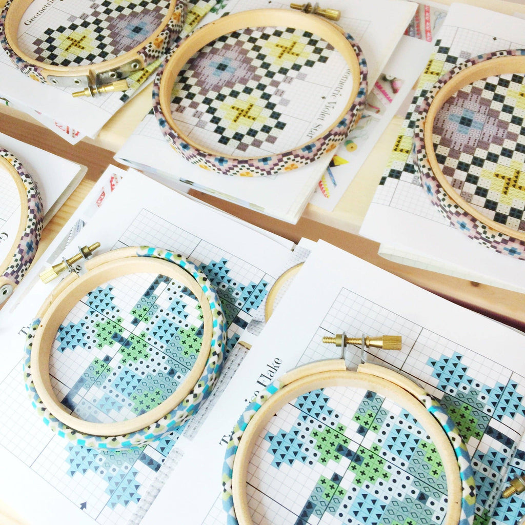 Geometric cross stitch hoop hanging as a wall or tree decoration