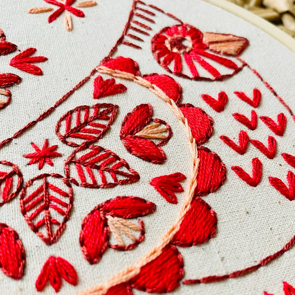 Finished Cardinal embroidery in a 6 inch hoop