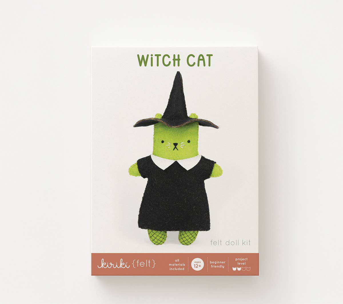 Witch Cat felt doll kit in its screen printed Kiriki Press packaging