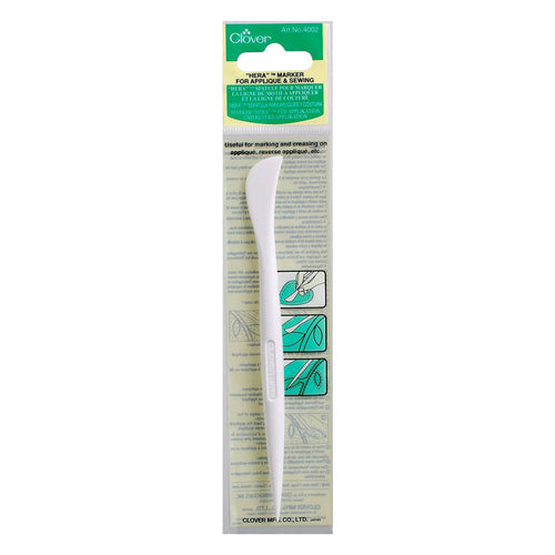 Clover Hera Marker, a curved urea resin tool for creasing and marking fabric