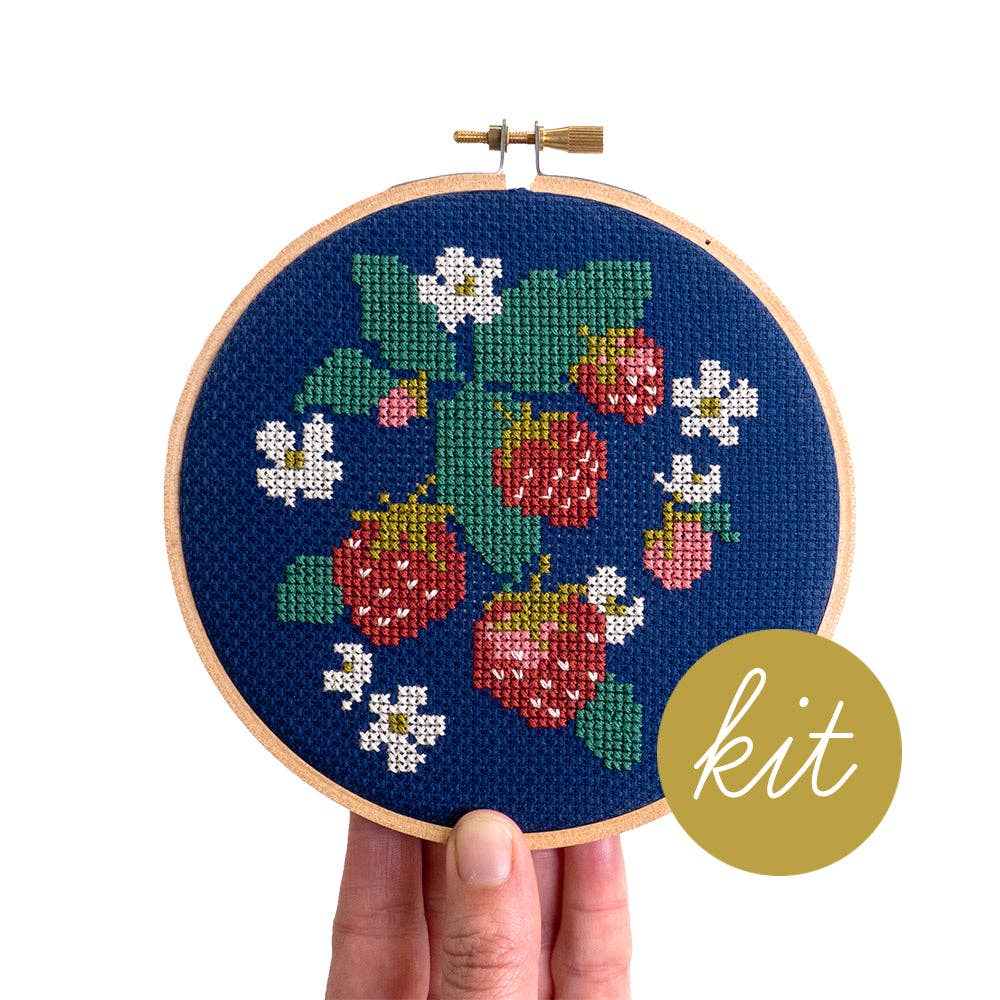 Spread Like Strawberries cross stitch kit by Junebug and Darlin, ripe strawberries stitched on navy cloth