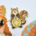 Mandala Squirrel magnetic needle minder by Meloca Designs, squirrel artwork in orange and brown