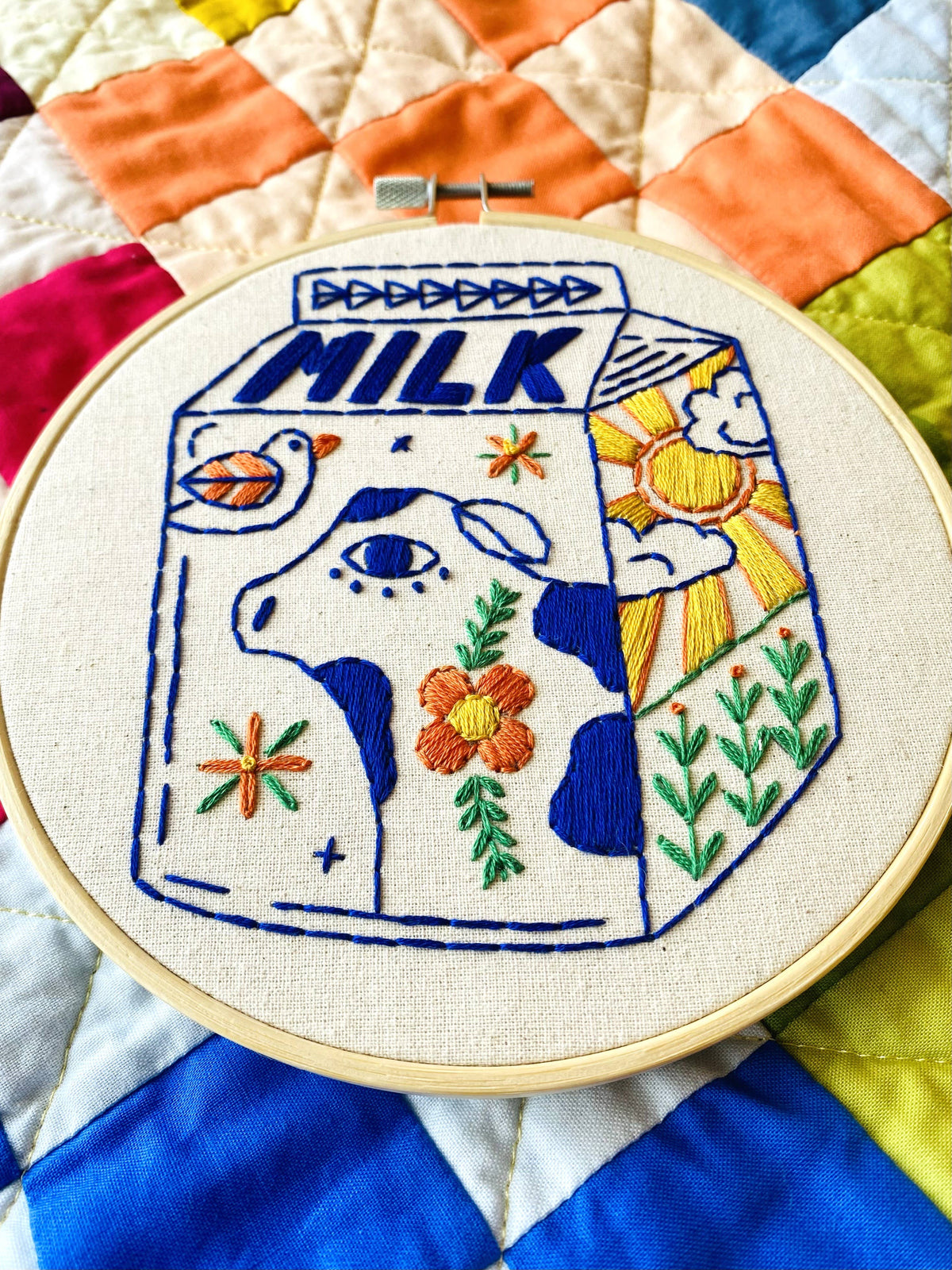 Finished Milk embroidery in a 6 inch hoop