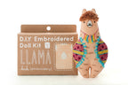 The finished Kiriki Press llama doll, about 4.5 inches tall, embroidered and stuffed