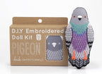The finished Kiriki Press pigeon doll, about 4.5 inches tall, embroidered and stuffed