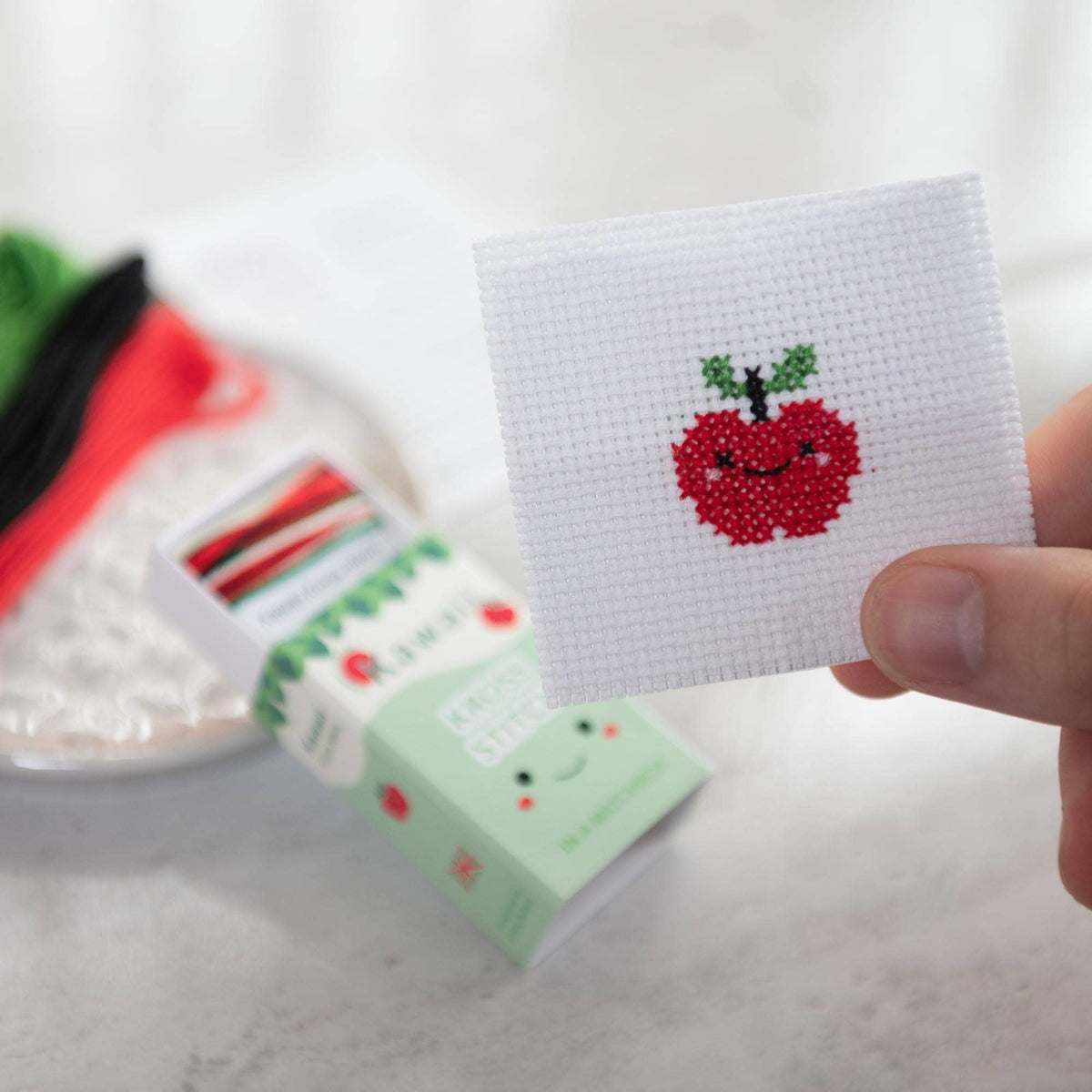 Kawaii apple cross stitch design on 14 count Aida