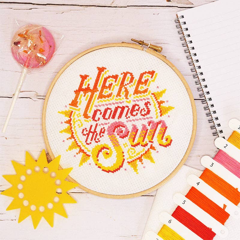 Here Comes the Sun cross stitch kit by Caterpillar Cross Stitch, designed by Emma Congdon of Stitchrovia