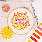 Here Comes the Sun cross stitch kit by Caterpillar Cross Stitch, designed by Emma Congdon of Stitchrovia