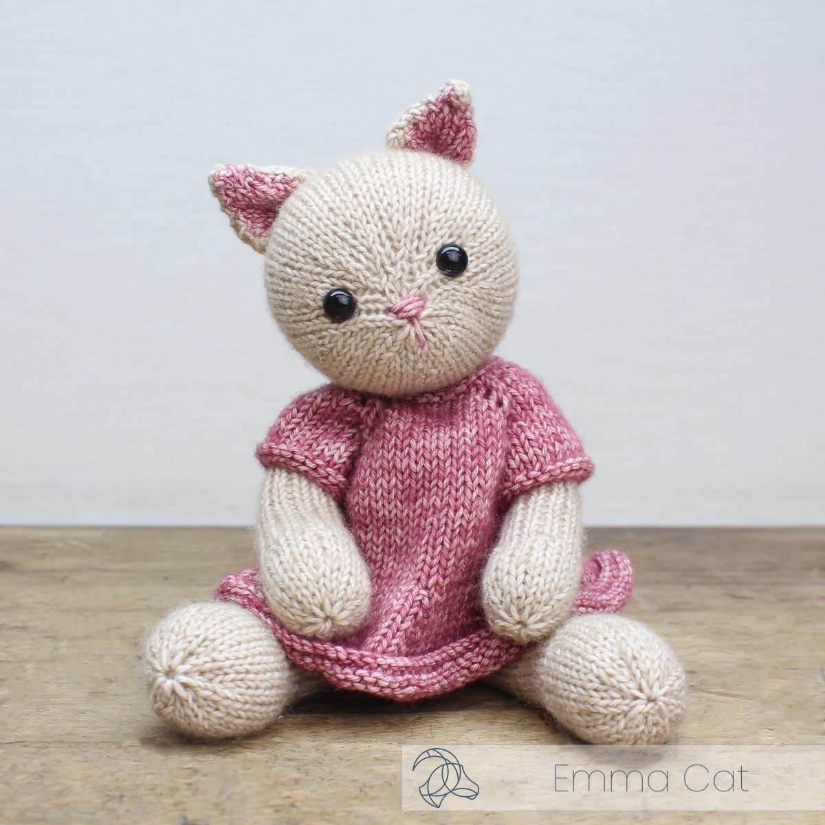 Finished Emma Cat knitted cat wearing a dress, about 25 cm tall
