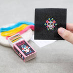 Day of the Dead Luna cross stitch design in jewel colours on black Aida
