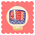 Sardines embroidery design on unbleached cotton in a hoop
