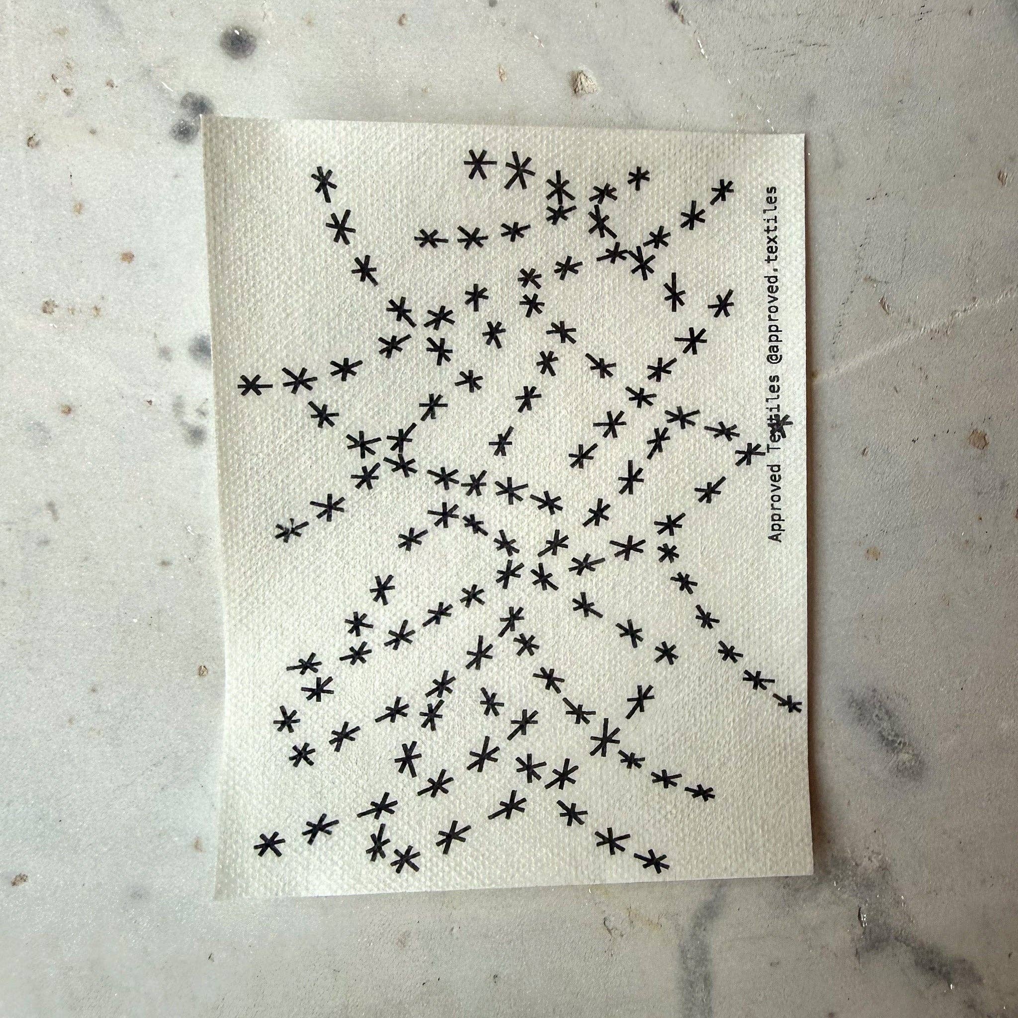 Hanabi wash-away sticker patterns for reinforcing and decorating worn fabric