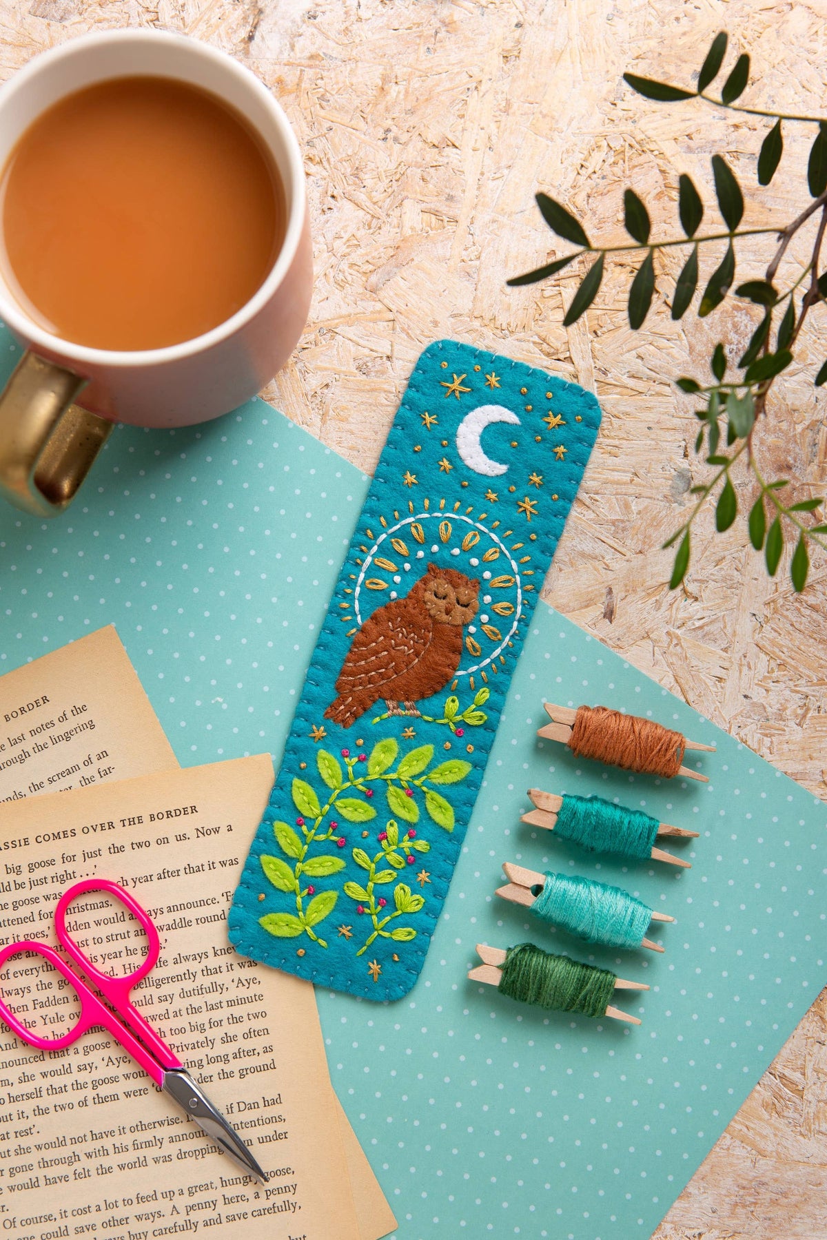 Owl felt bookmark in use in a book