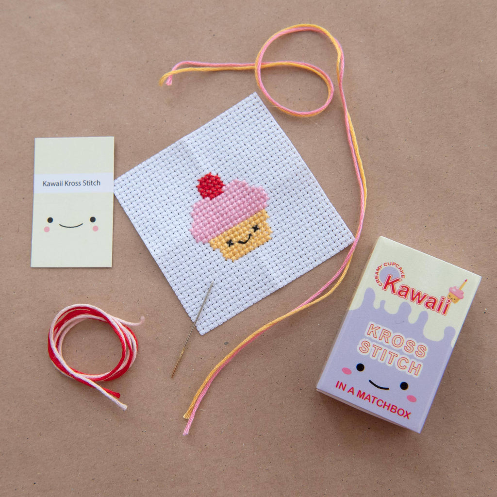Kawaii cupcake cross stitch design on 14 count Aida