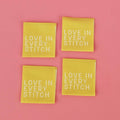 Love in Every Stitch single sided sew-in label in chartreuse on woven polyester