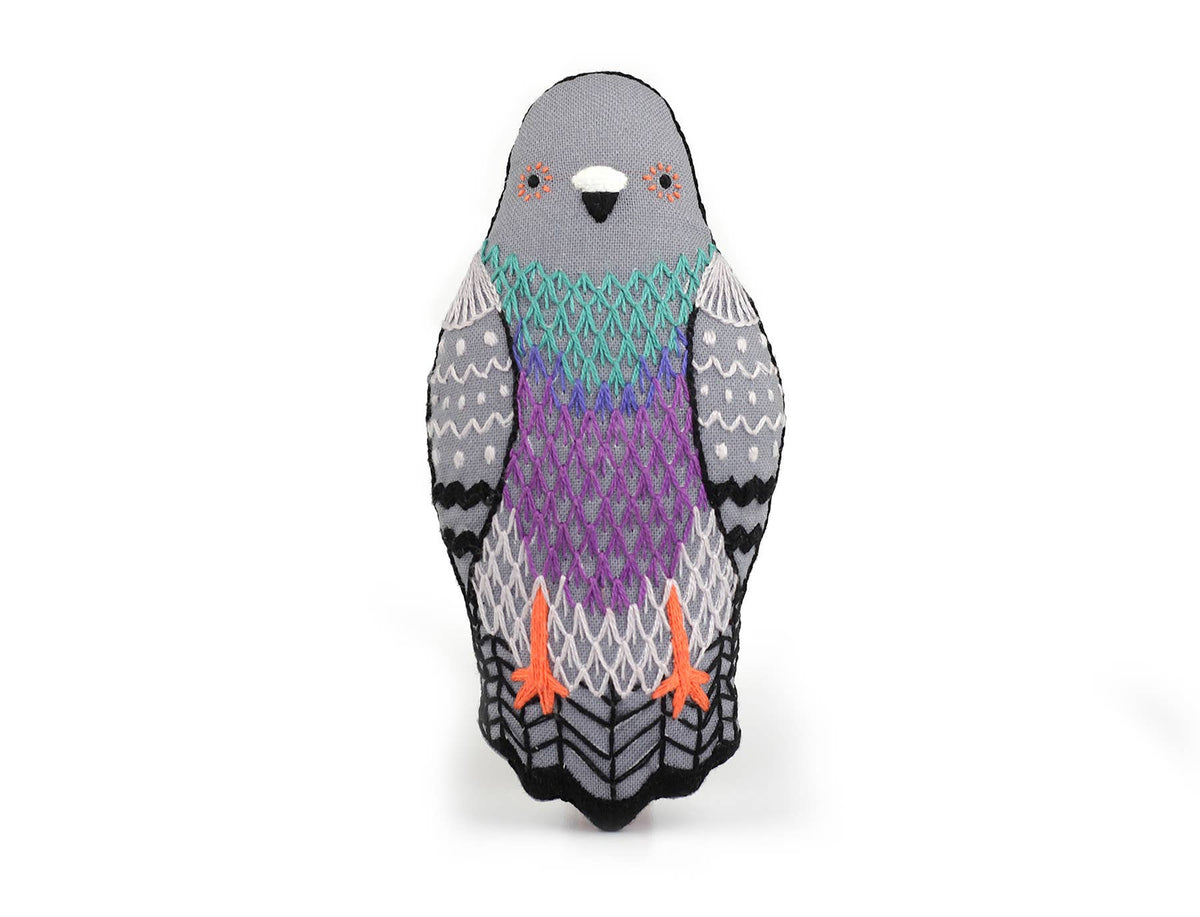 Pigeon embroidered doll kit contents from Kiriki Press with DMC floss, needle and stuffing