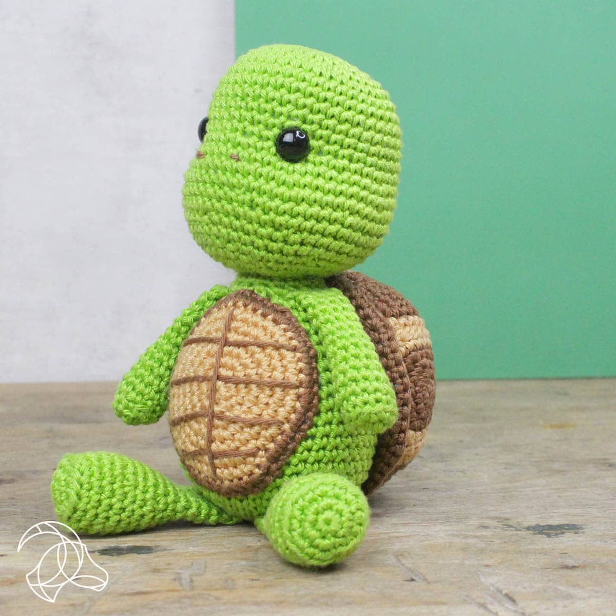 Finished Siem turtle amigurumi in green and brown organic cotton, 24 cm